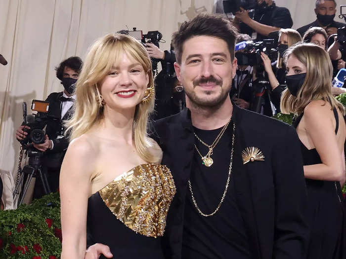 Carey Mulligan and Marcus Mumford looked chic in black-and-gold looks.