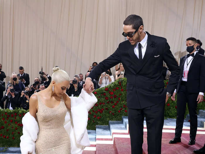 Pete Davidson helped Kim Kardashian walk in her skintight dress, which previously belonged to Marilyn Monroe.