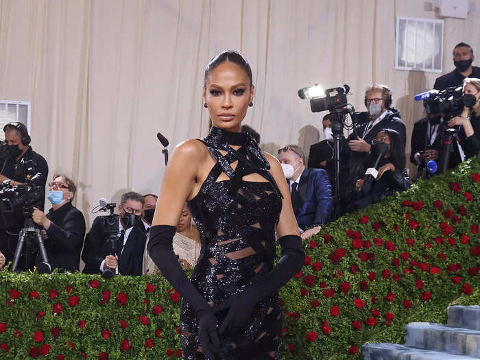 Joan Smalls wore a gown made of sparkling black straps.