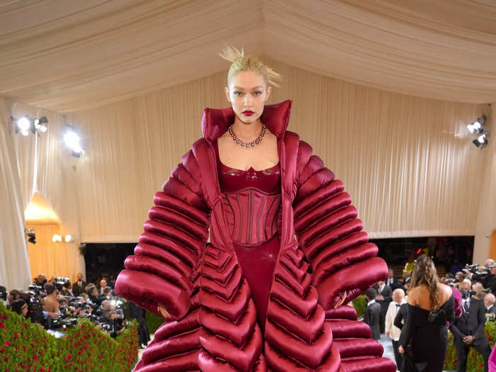 Gigi Hadid wore a PVC latex rouge ensemble that featured a daring corset.