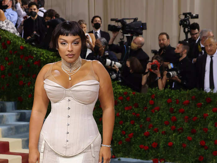 Paloma Elsesser’s creamy white silk satin corset added just the right amount of “Gilded Age” glamour to her Met Gala 2022 look.