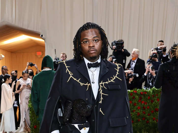 Rapper Gunna had thorns on his cape while his dog-shaped bag wore a tuxedo.