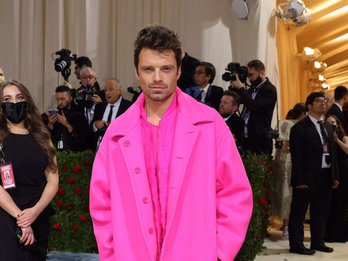Sebastian Stan stepped out off-theme but in-style in this hot-pink Valentino number.