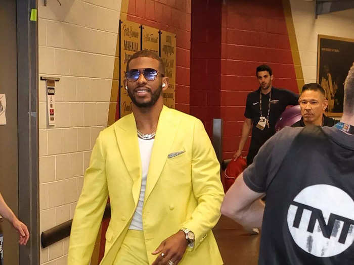 Chris Paul of the Phoenix Suns busted out a neon-yellow suit pre-game.