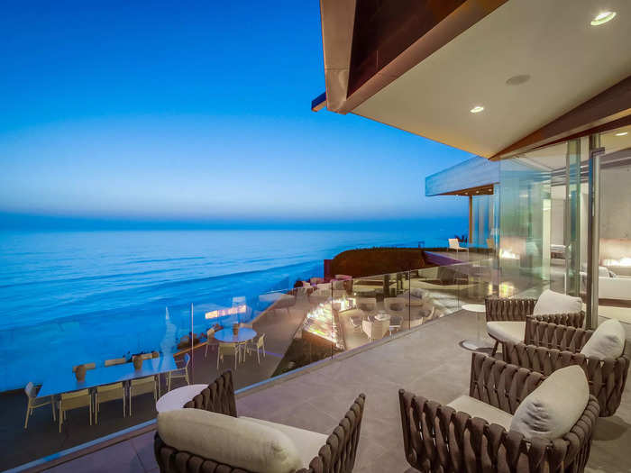 The home sits on less than half an acre but comes with 74 feet of waterfront access. It sits on top of a steep bank and overlooks the Pacific Ocean.