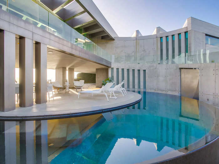 The Crescent House, named after its crescent-shaped infinity pool, was completed in 2003.