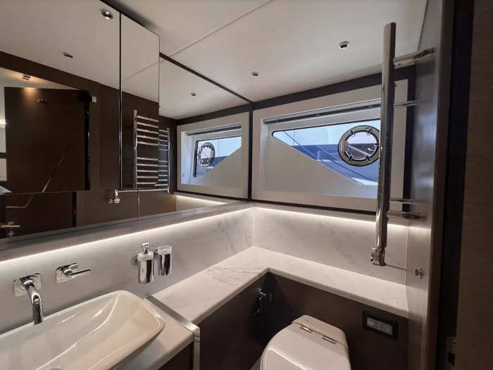 ... and an en-suite bathroom. The 65 Sport Yacht can accommodate up to seven people and one crew member.