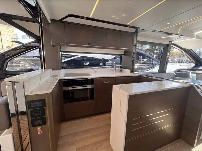 The yacht has a spacious open-plan living and dining area ...