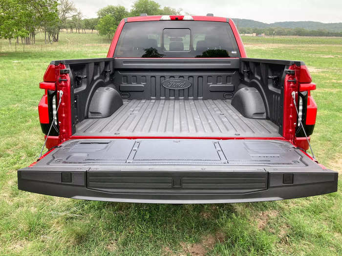 Out back, the Lariat has a powered tailgate with a built-in step, ruler, and spots to clamp down materials.