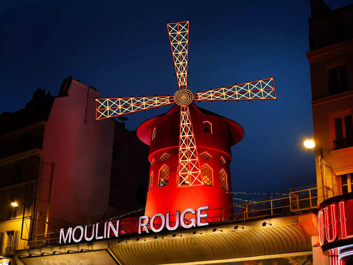 The Moulin Rouge, which means "red mill" in French, is a cabaret in Paris, France. It is often credited with popularizing the modern version of the can-can.