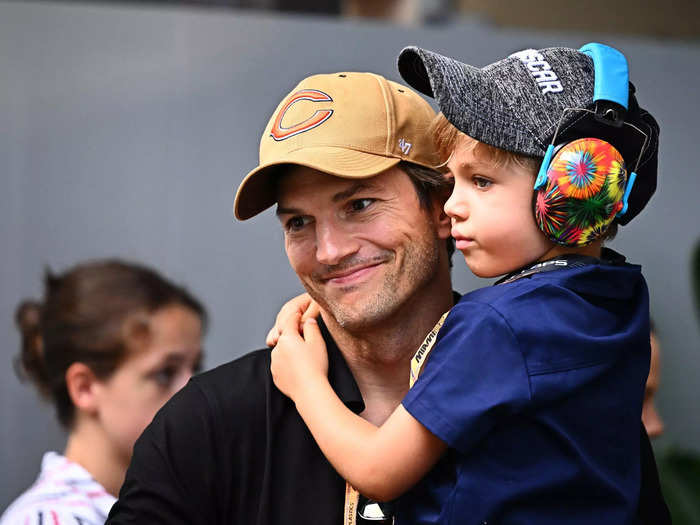 Ashton Kutcher and his son Dmitri strolled the paddock.