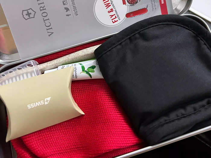 I also received an amenity kit filled with in-flight essentials like socks, toiletries, and an eye mask.