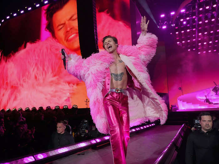 Harry Styles rocked the trend at Coachella in April, this time pairing an extravagant feathered coat with hot-pink pants.