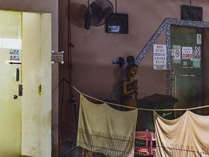 Many of these brothels are set up "fish tank"-style where sex workers line up behind a glass panel to be selected by customers.