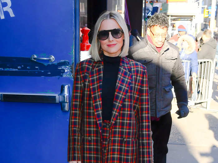 The star of "The Good Place" sported a floor-length plaid coat and matching pants in New York City in 2020.