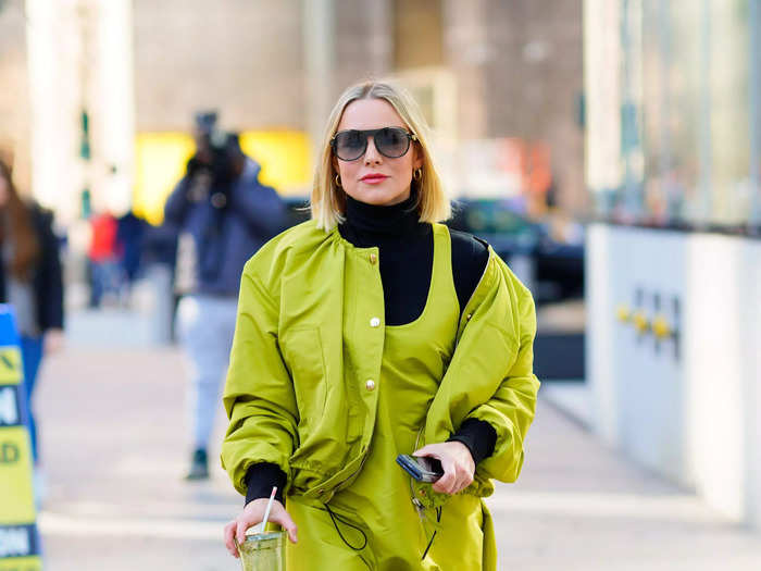 The "Veronica Mars" actress showed off her best street style in a lime green dress and matching jacket in 2020.