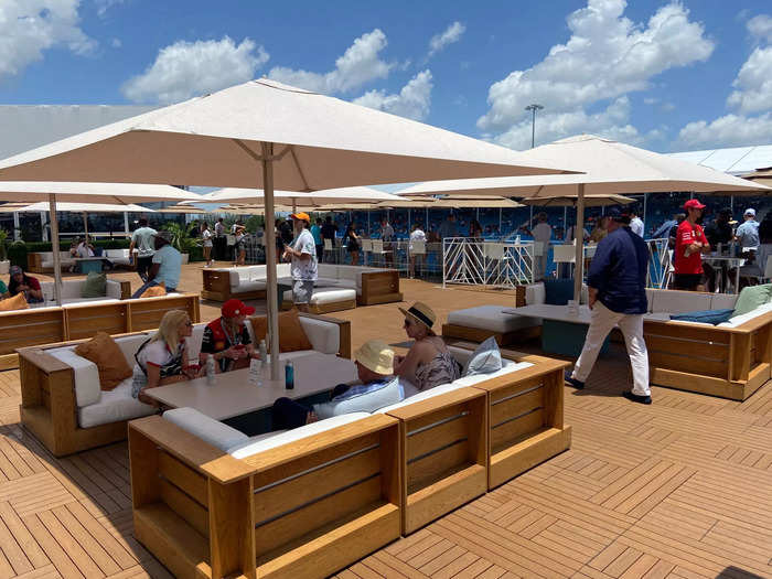 On the top floor of the paddock club, there was also an outside area with lots of seating and umbrellas, although many of the seats were reserved for specific groups.