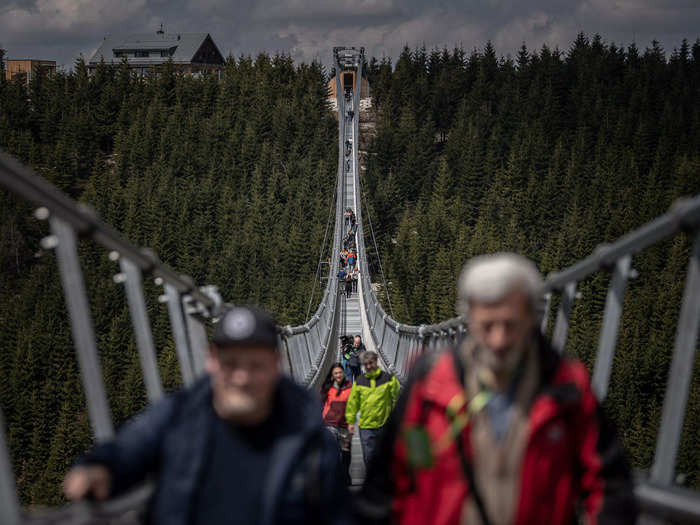 People crossing the walkway may feel it shake from wind.