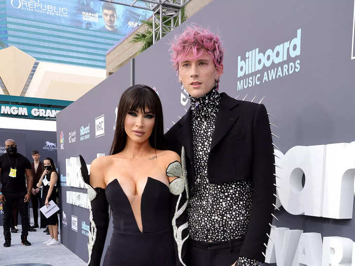 Megan Fox and Machine Gun Kelly wore matching black-and-silver looks.