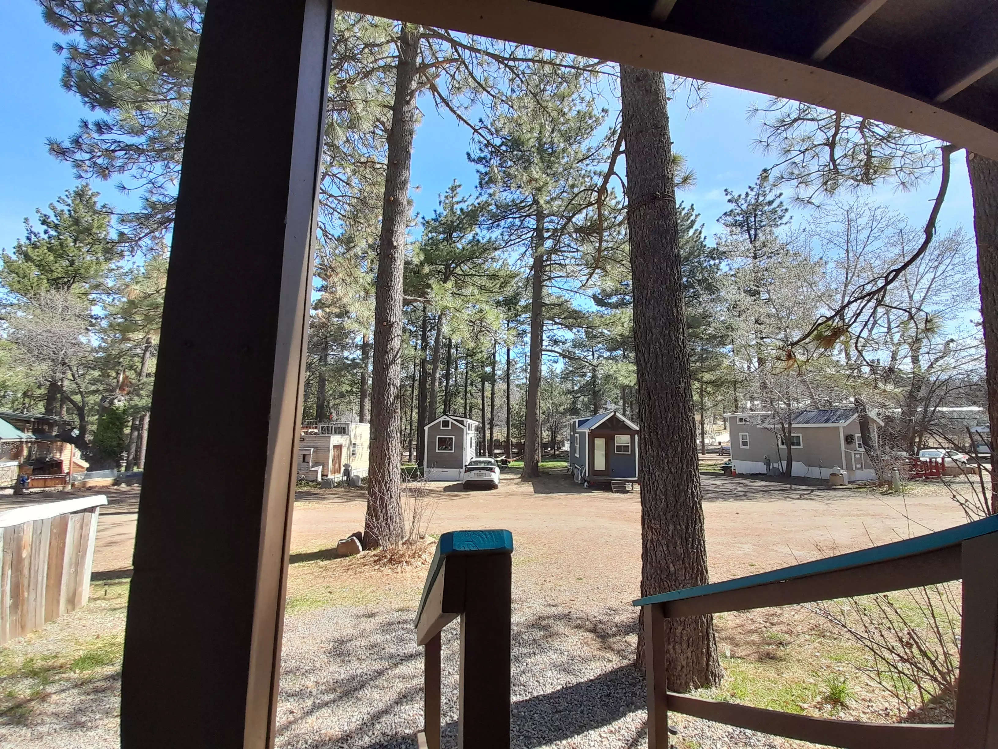 the view from the porch of a tiny home — more tiny homes