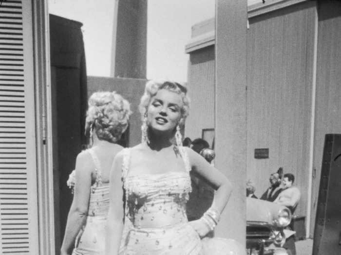 Monroe was seen in a striking two-tone beaded gown on the set of "There