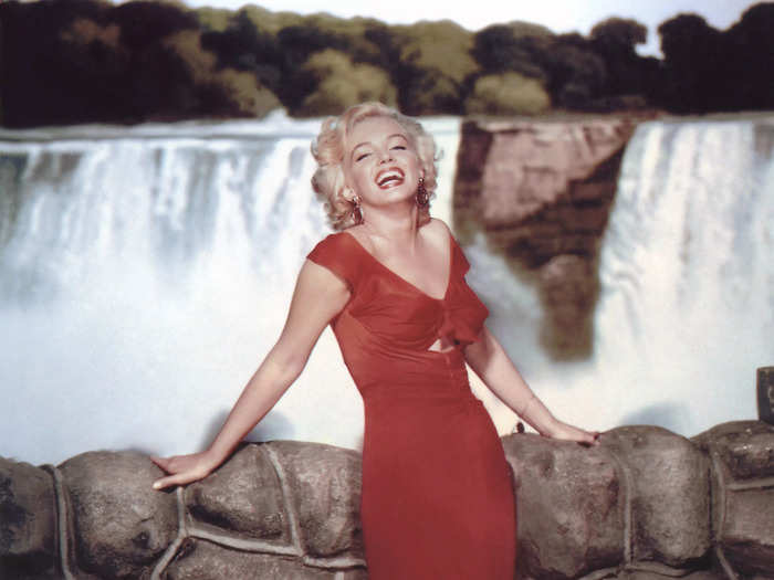 Starring in "Niagara" in 1953, Monroe wore a hot-pink midi dress with a chest cutout and bow tie. She also wore a red version of the design on set.