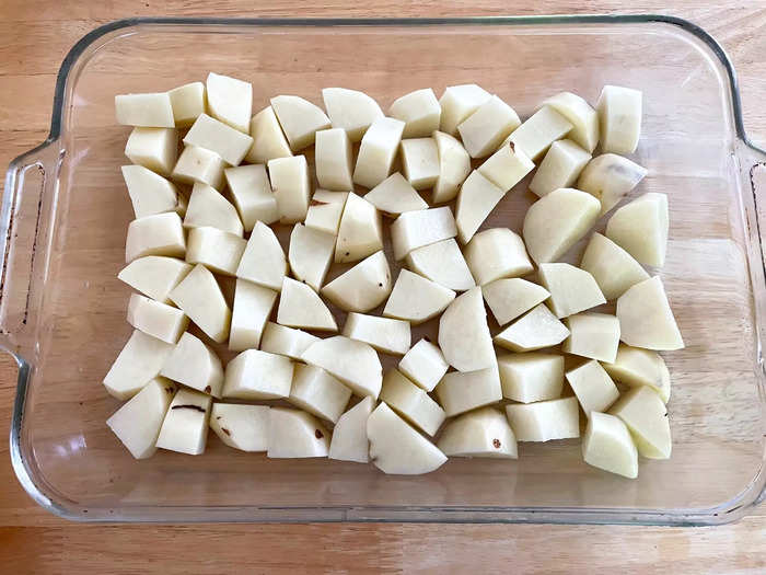 Then throw your potato pieces into the pan.