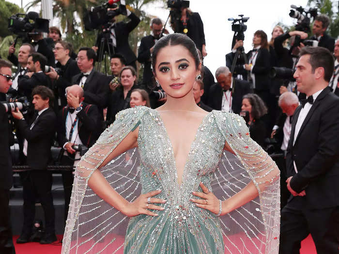 Helly Shah dazzled in a teal gown with a plunging neckline.