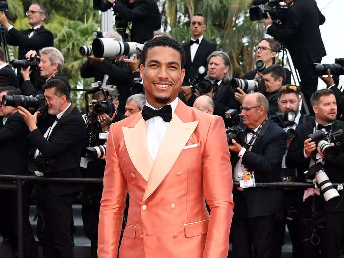 Greg Tarzan Davis attended the same event in a creamsicle-orange tuxedo.