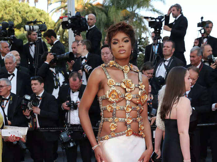 Didi Stone stood out in a gilded gown that had a top covered in cutouts.