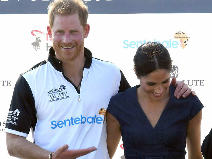 Harry and Markle shared a quick public kiss after Harry won a charity polo game on July 26, 2018.