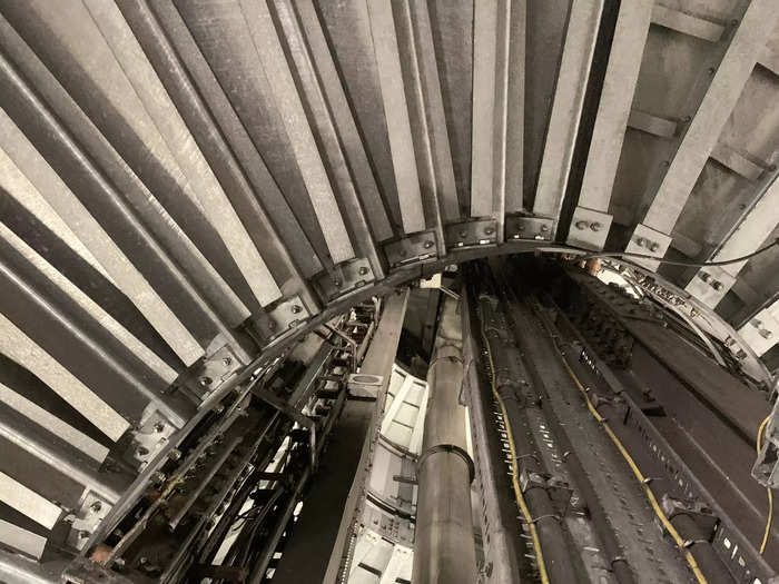 We descended down a former construction shaft to platform level. The original station was designed with eight lifts, four of which descend 26 meters to one of London