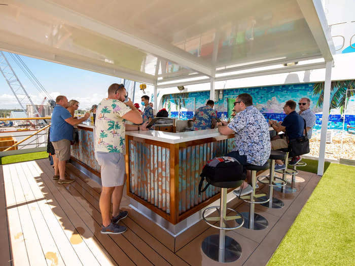 … the 12 Volt Pool Bar, another open-air bar with views of a pool and ocean.