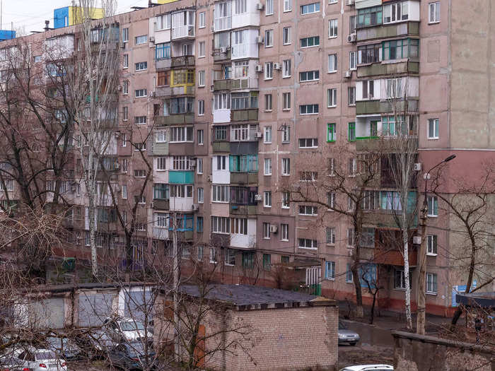 Before: Residential buildings in Mariupol before Russian troops bombarded the city.