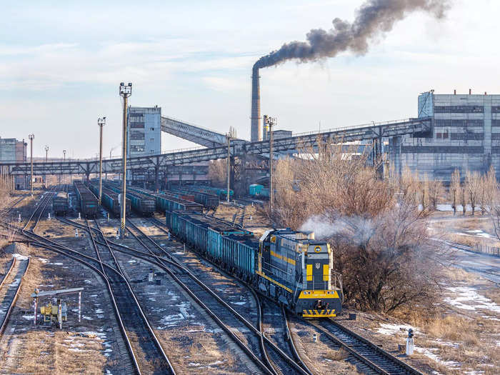 Before: A rail vehicle is seen loaded with coal, a key Ukrainian export along with steel.