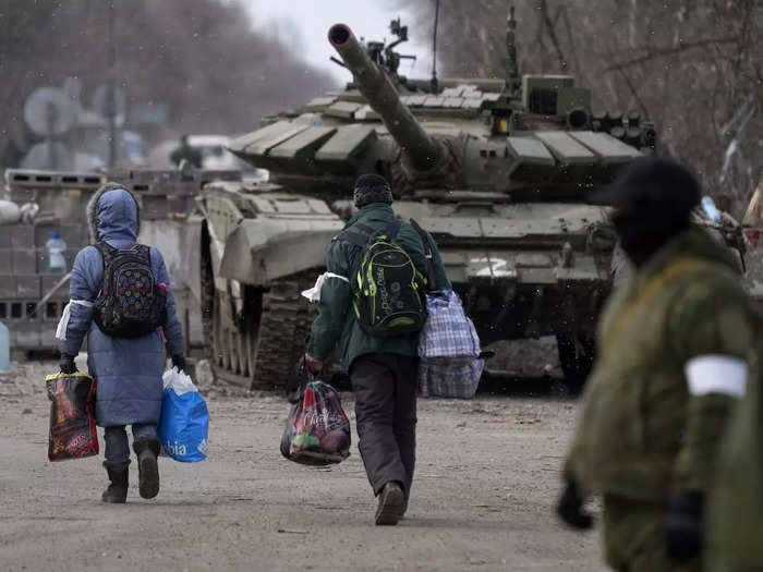 After: In April, Ukrainian President Volodymyr Zelenskyy said approximately 100,000 civilians remained in the city as Russian troops attacked.