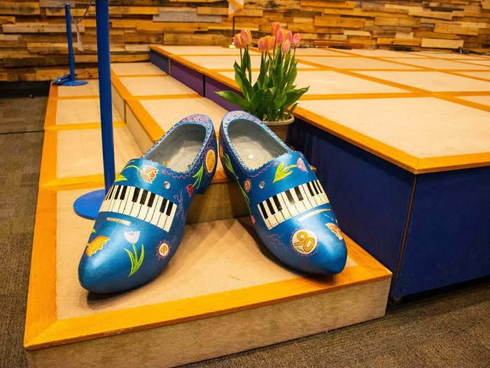 A fun surprise at the quilt show were these large, wooden clogs that decorated the room. This pair was my favorite, painted with tulips and pianos.