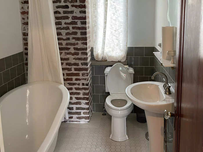 The renovated bathrooms have claw-foot bathtubs, which he added because they were in style in the 1930s.