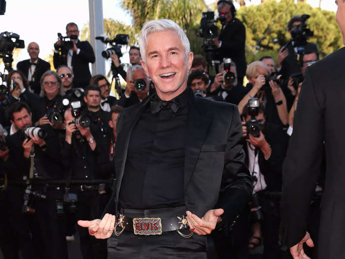 Butler was joined on the red carpet by director Baz Lurhmann who sported a gold belt with a large 