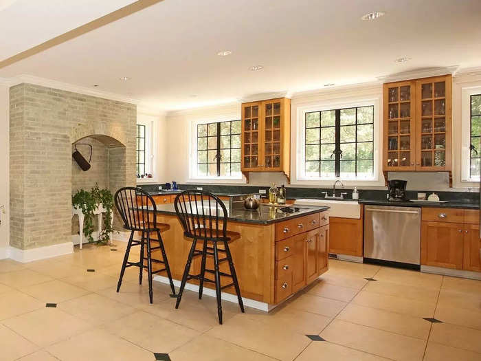 The open-concept kitchen comes with a large island counter.