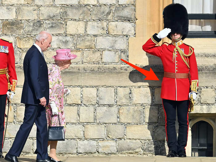 According to a guard who spoke to Insider at a royal event, the bright-red color of the tunics is rooted in tradition and helps cover up bloodstains.