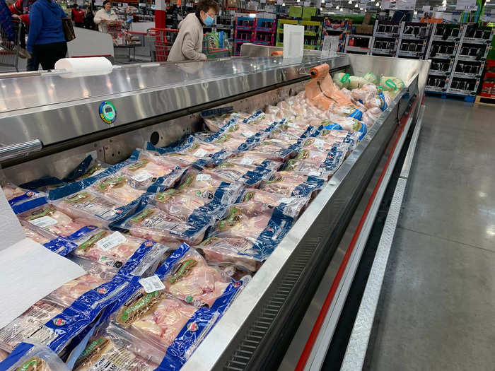 Rows and rows of refrigerated cases hold more meat products.