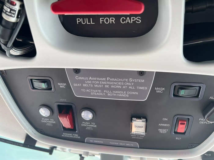 A red handle located on the ceiling of the Cirrus Vision Jet deploys the parachute. According to a Cirrus pilot website, the parachute has been deployed over 100 times and saved more than 200 people.