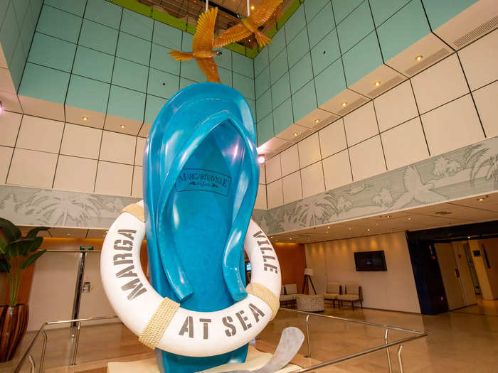 When I first boarded the ship and came face-to-face with a towering flip flop statue, I was mentally prepared to be thrown into the world of Jimmy Buffett and Margaritaville.