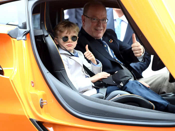 Prince Jacques of Monaco and his father Prince Albert of Monaco give a thumbs up before the race.