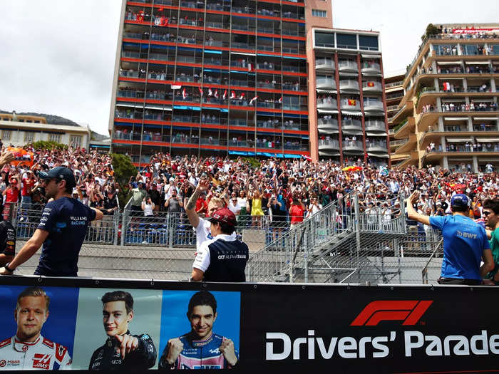 The drivers wave to the fans during the pre-race parade.