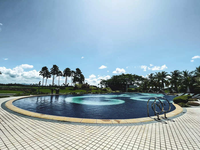 Overlooking the golf course was a massive swimming pool.