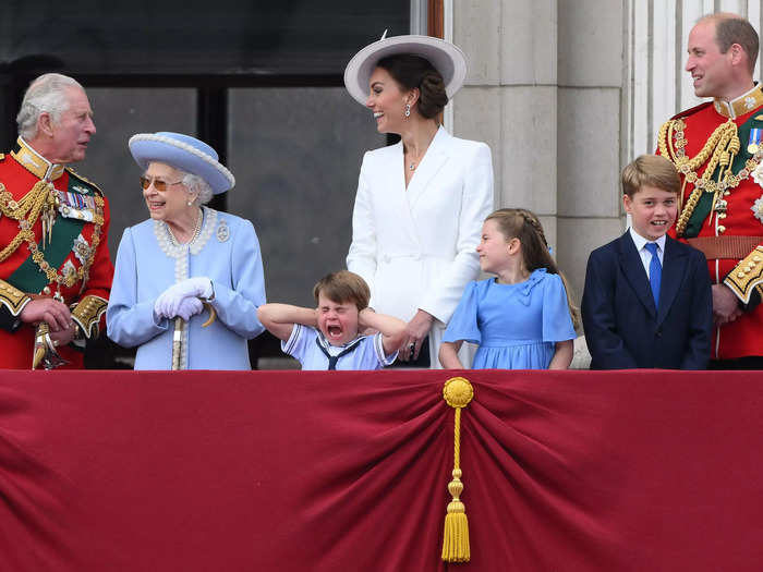 At one point, Prince Louis covered his ears as the noisy aircraft flew overhead.