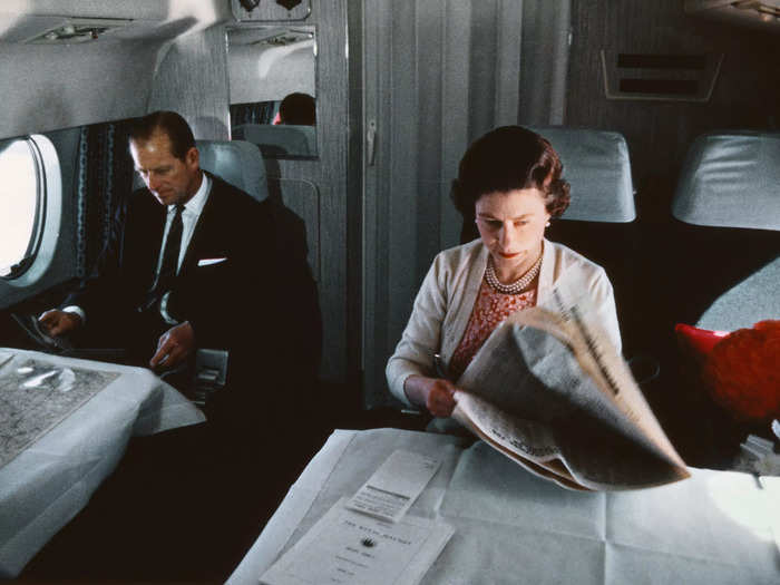 Candid private photos of Queen Elizabeth are few and far between, so this photo of her and Prince Philip on an airplane stands out.