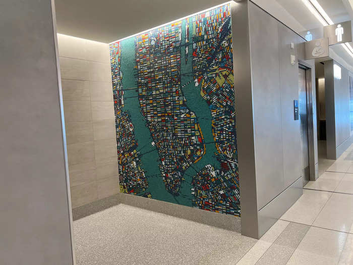 The entrances to the bathrooms in the concourses have large mosaic artwork that represents different parts of New York.